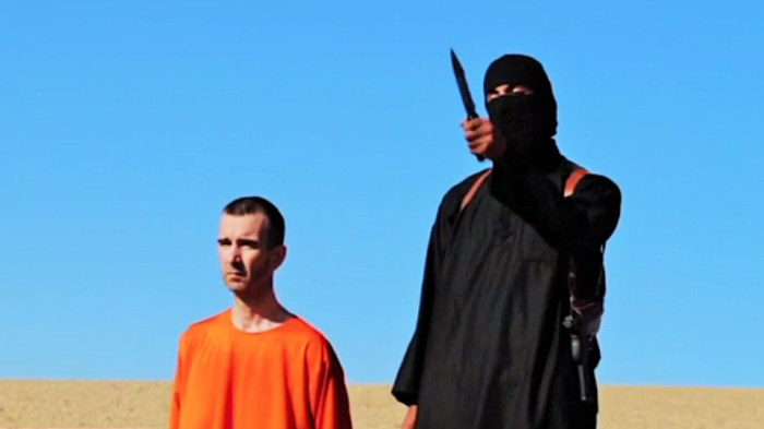 British aid worker David Haines seen with an ISIS militant in a video