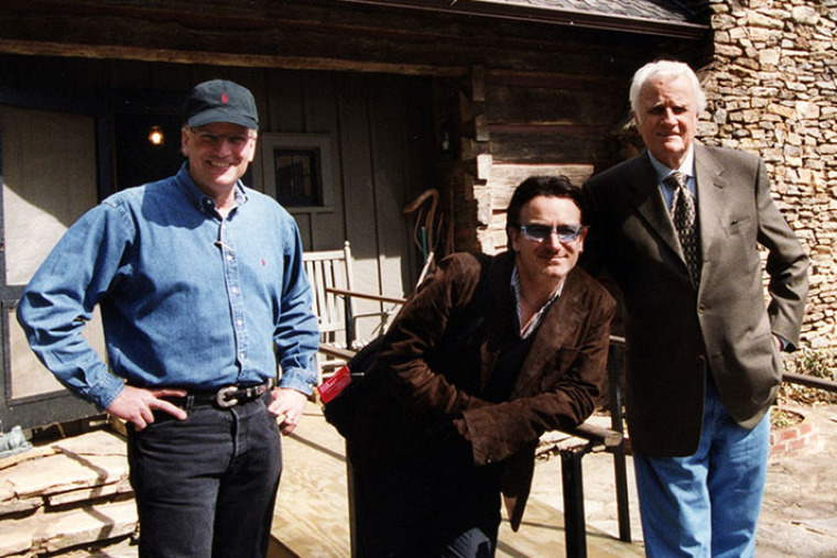 Franklin Graham, Bono and Billy Graham in Montreat, North Carolina, in 2002