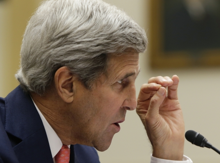 U.S. Secretary of State John Kerry testifies before a House Foreign Affairs Committee hearing on 'The ISIS Threat: Weighing the Obama Administration's Response' on Capitol Hill in Washington September 18, 2014
