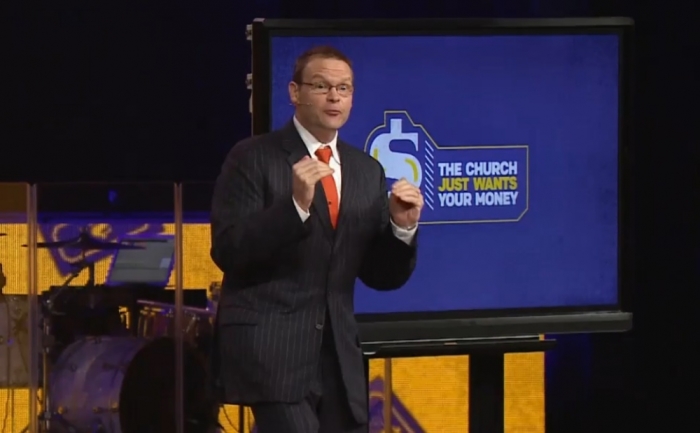 Pastor Perry Noble preaches during 'The Church Just Wants Your Money' sermon series.