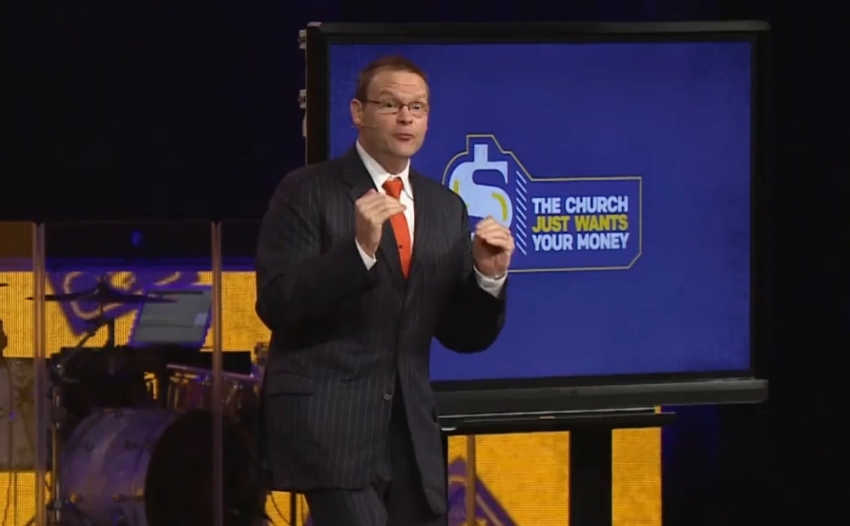 Pastor Perry Noble preaches during "The Church Just Wants Your Money" sermon series.