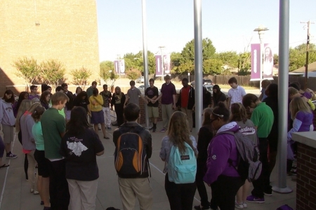 Students in prayer during the "See You at the Pole" observance held annually on the fourth Thursday in September.