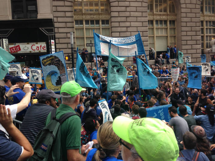 #FloodWallStreet protesters descended on the financial district in New York City on Monday, Sept. 22, 2014.