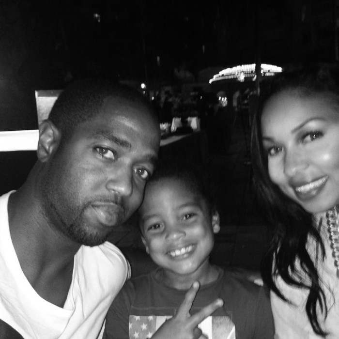 Tony Gaskins poses alongside his wife Sheri and their oldest son
