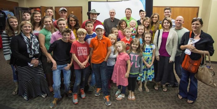 Photo of Buddy David, Ken Ham, and the Duggar family who visited the Creation Museum on Sept. 23, 2014.