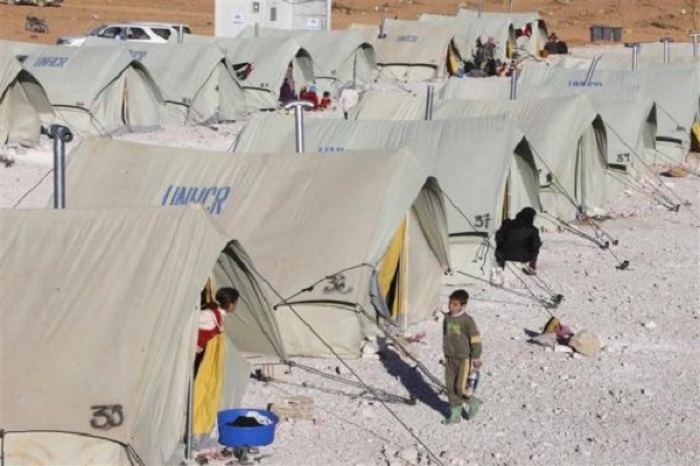 A general view shows tents set up by the U.N. for Syrian refugees at the Lebanese border town of Arsal, in the eastern Bekaa Valley November 29, 2013.