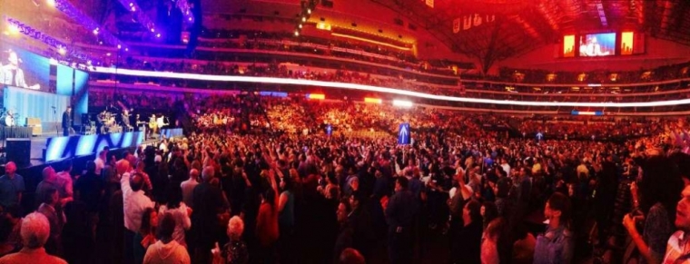 Phil Wickham performs for a sold-out crowd of 19,000 for Harvest America at the American Airlines Center and Victory Park in Dallas, Texas, Oct. 5, 2014.