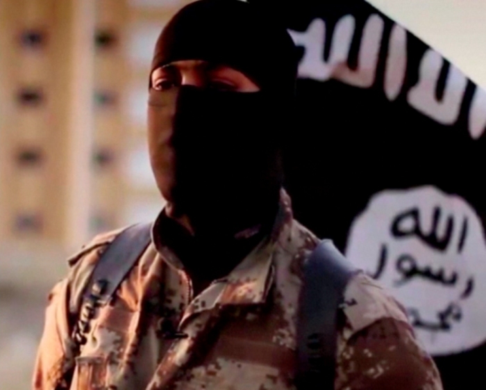 A masked man speaking in what is believed to be a North American accent in a video that Islamic State militants released in September 2014 is pictured in this still frame from video obtained by Reuters, October 7, 2014. The FBI said it was seeking information on the man's identity, and issued an appeal for help in identifying individuals heading overseas to join militants in combat.