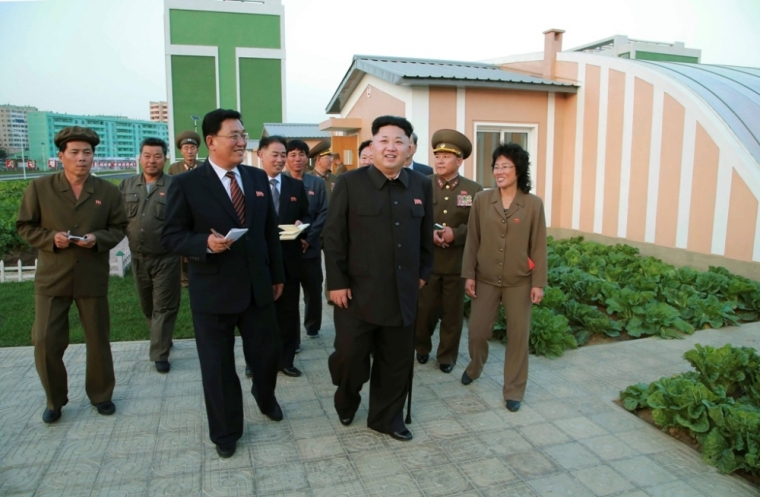 North Korean dictator Kim Jong Un gives field guidance at the newly built Wisong Scientists Residential District in this undated photo released by North Korea's Korean Central News Agency in Pyongyang, October 14, 2014. Kim, shown using a cane for support, re-appeared in state media on Tuesday after a lengthy public absence that had fueled speculation over his health and grip on power in the secretive, nuclear-capable country.