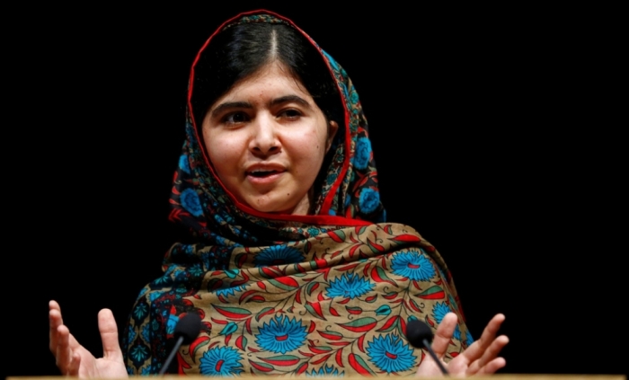 Pakistani schoolgirl Malala Yousafzai, the joint winner of the Nobel Peace Prize, speaks at Birmingham library in Birmingham, central England, October 10, 2014. Pakistani teenager Yousafzai, who was shot in the head by the Taliban in 2012 for advocating girls' right to education, and Indian campaigner against child trafficking and labour Kailash Satyarthi won the 2014 Nobel Peace Prize on Friday.