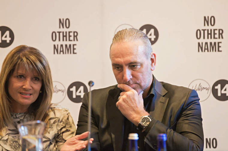 Pastors Brian Houston and Bobbie Houston of Hillsong Church appear at a press conference on Thursday, Oct. 16, 2014, at The Eventi Hotel in New York City.