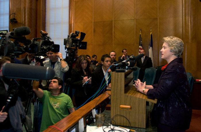 Houston Mayor Annise Parker (R) talks during a news conference after she presided over her first City Council meeting following her inauguration in Houston January 4, 2010.