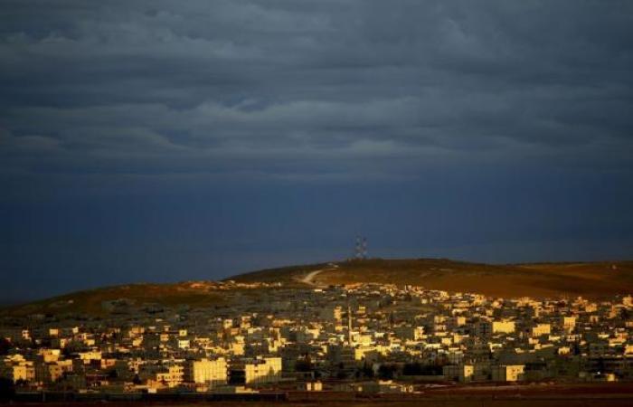 A general view of the Syrian town of Kobane is pictured from near the Mursitpinar border crossing, on the Turkish-Syrian border in the southeastern town of Suruc, October 19, 2014.