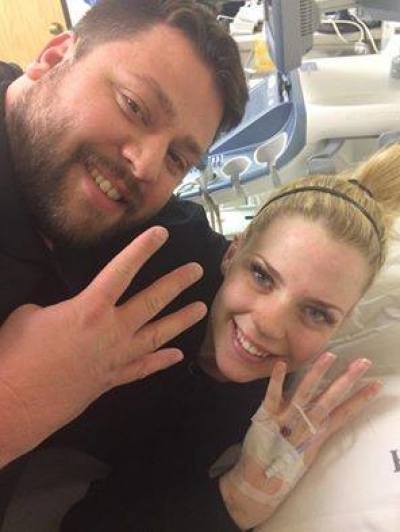 Ashley and Tyson Gardner after she had surgery to save their quadruplets.