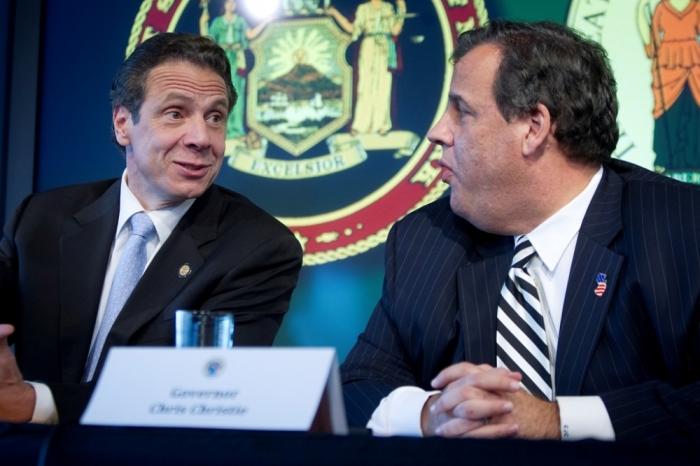 Governors of New Jersey Chris Christie (R) and of New York Andrew Cuomo speak during a news conference about New York's first case of Ebola, in New York, October 24, 2014. Dr. Craig Spencer, 33, who treated Ebola patients in West Africa, was moved with elaborate precautions from his Harlem apartment to Bellevue Hospital in Manhattan with a fever and tested positive for Ebola on Thursday, sparking concern about the spread of the disease in the country's most populous city.