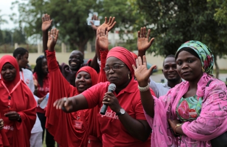 Campaigners from "#Bring Back Our Girls" gesture during a rally calling for the release of the Abuja school girls who were abducted by Boko Haram militants, in Abuja, Nigeria, October 17, 2014.