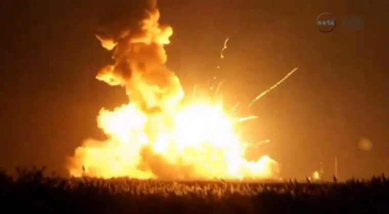 An unmanned Antares rocket is seen exploding seconds after lift off from a commercial launch pad in this still image from NASA video at Wallops Island, Virginia, October 28, 2014. The 14-story rocket, built and launched by Orbital Sciences Corp, bolted off its seaside launch pad at the Wallops Flight Facility at 6:22 p.m. It exploded seconds later. The cause of the accident was not immediately available.