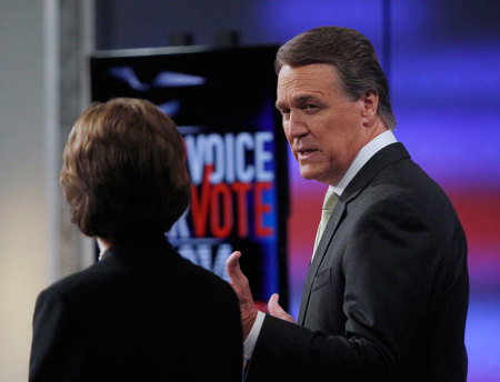 Republican U.S. Senatorial Candidate David Perdue (R) addresses rival Democratic candidate Michelle Nunn (L) at their final debate before the November 4 election in Atlanta, Georgia November 2, 2014.