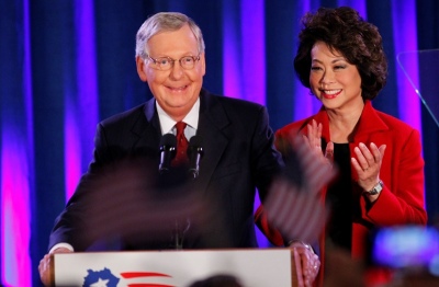 U.S. Senate Minority Leader Mitch McConnell, R-Ky., prepares to speak to supporters while accompanied by his wife, former United States Secretary of Labor Elaine Chao, at his midterm election night rally in Louisville, Kentucky, November 4, 2014. Television news networks are projecting that McConnell will win the election.