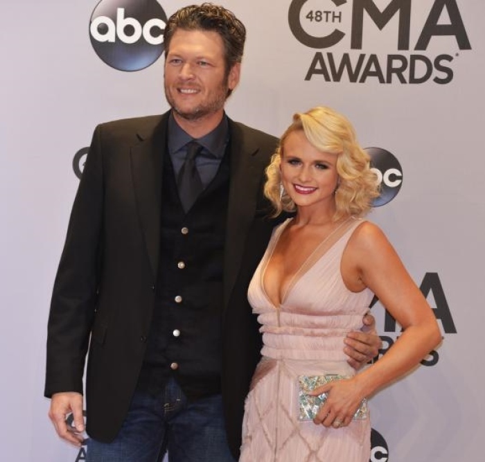 Musicians Blake Shelton and Miranda Lambert arrive at the 48th Country Music Association Awards in Nashville, Tennessee November 5, 2014.