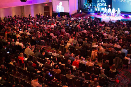 Speakers appear on stage during a panel discussion at the Movement Day, a Christian conference held on Thursday, Oct. 23, 2014, at The New York Marriott Marquis Hotel in New York City.