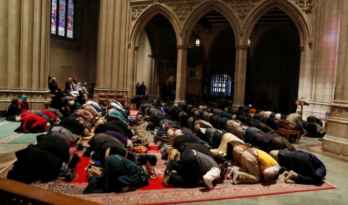 The Washington National Cathedral and five Muslim groups hold the first celebration of Muslim Friday prayers, Jumaa, in the cathedral's north transept in Washington, November 14, 2014.