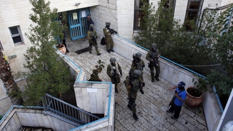 Jerusalem police responding to Nov. 18, 2014 attack at a Jerusalem synagogue.