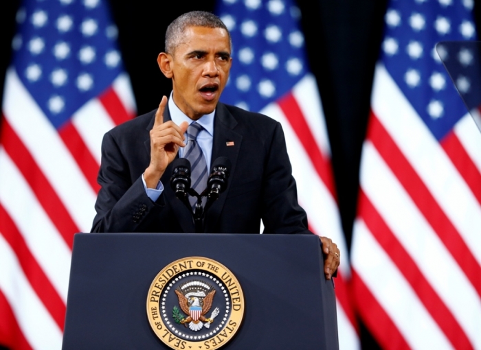 U.S. President Barack Obama delivers remarks on his use of executive authority to relax U.S. immigration policy during a speech at Del Sol High School in Vegas, Nevada, November 21, 2014. Obama imposed the most sweeping immigration reform in a generation on Thursday, easing the threat of deportation for about 5 million illegal immigrants.