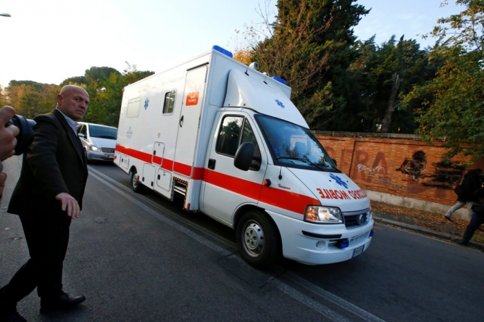 An ambulance carrying an Italian doctor, who contracted Ebola while working in Sierra Leone, arrives at the Lazzaro Spallanzani infectious diseases institute in Rome, Italy, November 25, 2014.