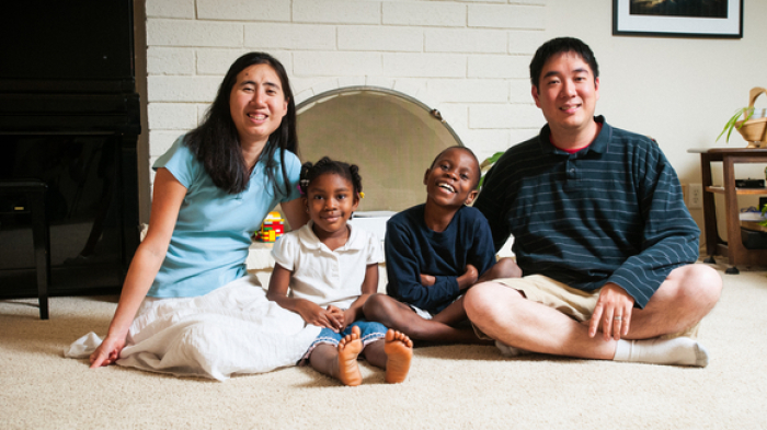 Grace and Matt Huang with two of their three adopted children
