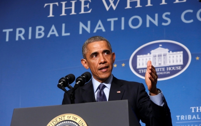 U.S. President Barack Obama delivers remarks at the White House Tribal Nations Conference in Washington, December 3, 2014.