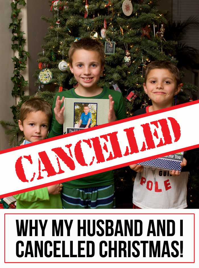 Lisa Henderson's children with a 'Cancelled Christmas' sign.