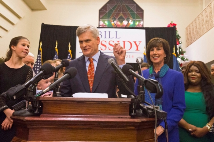 Republican U.S. Representative Bill Cassidy addresses supporters after announcing his win in the run-off election for U.S. Senate against Democrat Mary Landrieu in Baton Rouge, Louisiana, December 6, 2014. At right, wife, Laura Cassidy. At left, daughter, Kate.