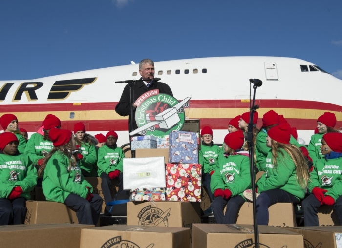 Samaritan's Purse President Franklin Graham delivers remarks at a press conference held at Baltimore-Washington International Airport on Dec. 10, 2014 announcing the Operation Christmas Child airlift of over 60,000 gift-filled shoeboxes to the Kurdish-controlled region of Northern Iraq.