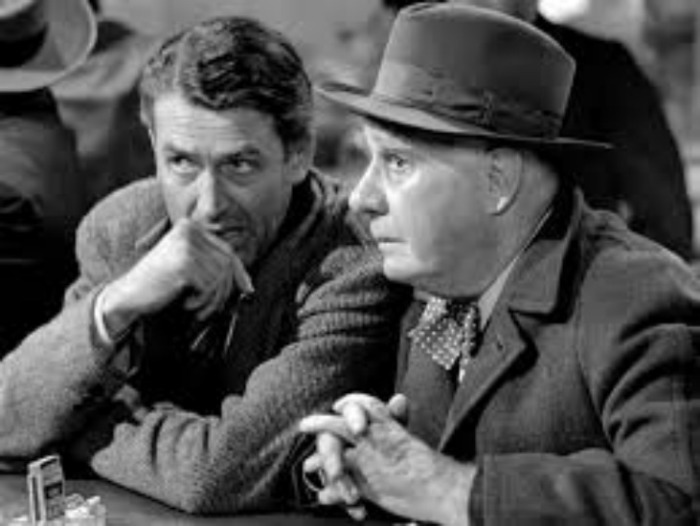 Jimmy Stewart as George Bailey with his guardian angel, Clarence, in the 1946 classic, It's a Wonderful Life.