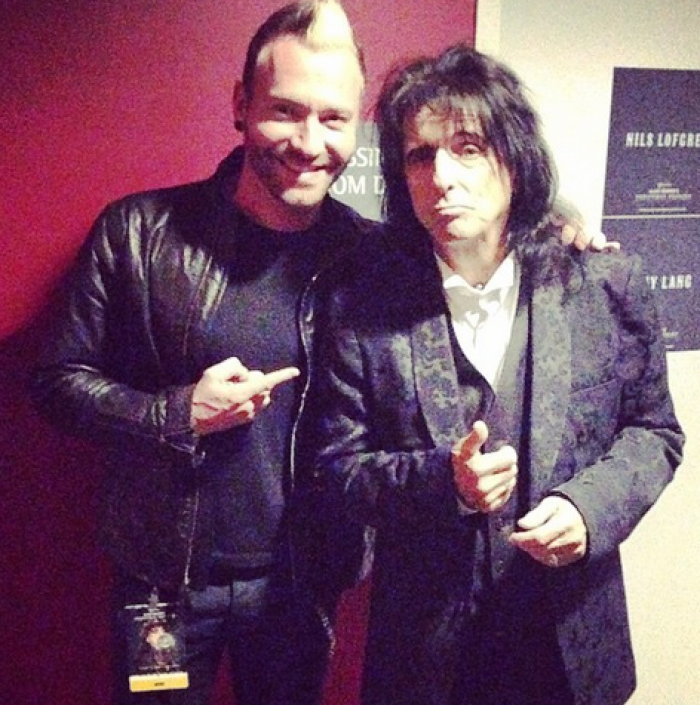 Thousand Foot Krutch lead singer poses with Alice Cooper.