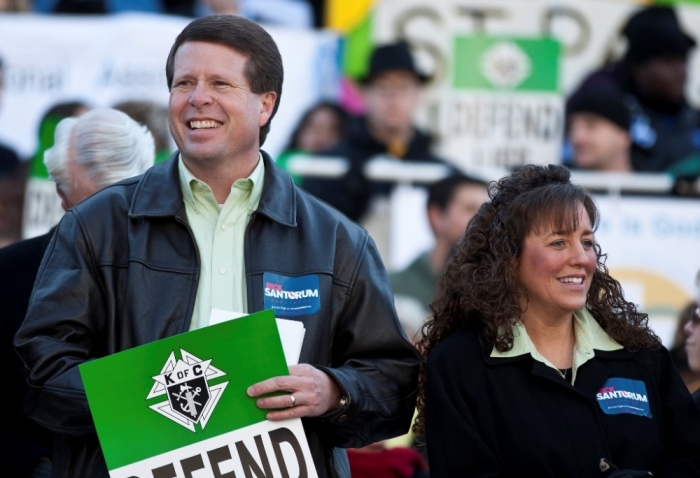 Jim Bob Duggar (L) and his wife Michelle Duggar (R), supporters of Republican presidential candidate and former Pennsylvania Senator Rick Santorum, attend a Pro-Life rally in Columbia, South Carolina, on the steps of the State House, January 14, 2012.