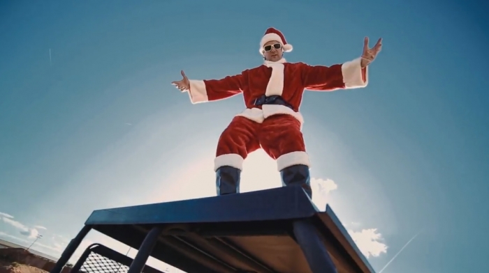 PGA Golfer Bubba Watson dressed as Santa and rapping his new single 'Bubbaclaus.'