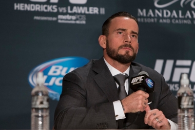 CM Punk answers questions at the UFC 181 Media Scrum