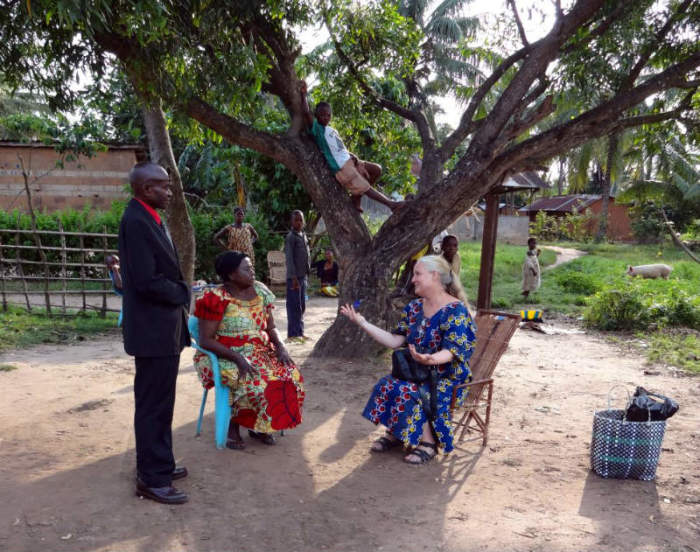 Christi Boyd, talks with the Rev. Christine Ngalula of the Presbyterian Community in Congo about a campaign to fight cultural practices against widows while the North West Kasai Synod Executive, the Rev. Tshipamba, looks on in this Jan. 2014 photo.