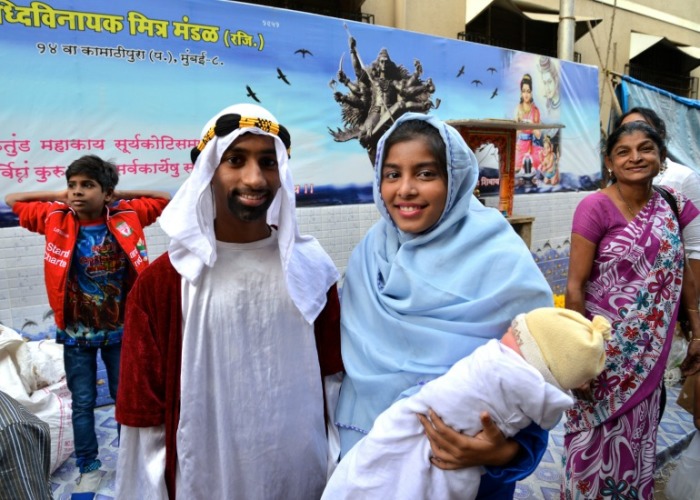 Children from the Bombay Teen Challenge 'Set Beautiful Free' initiative prepare for the live Nativity Scene in Mumbai's red light district.