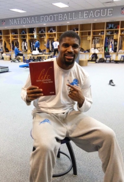 Don Carey from the Detroit Lions participated in Athletes for Charity's Bible giveaway in 2014.