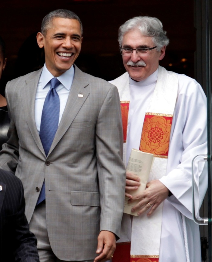U.S. President Barack Obama walks out with Rev. Luis Leon after attending Easter service at St. John's Episcopal Church in Washington, March 31, 2013.