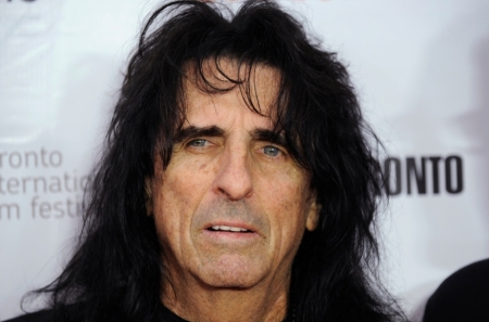 Alice Cooper poses on the red carpet before a screening of the film "Supermensch: The Legend of Shep Gordon" at Roy Thomson Hall during the 38th Toronto International Film Festival in Toronto September 7, 2013.