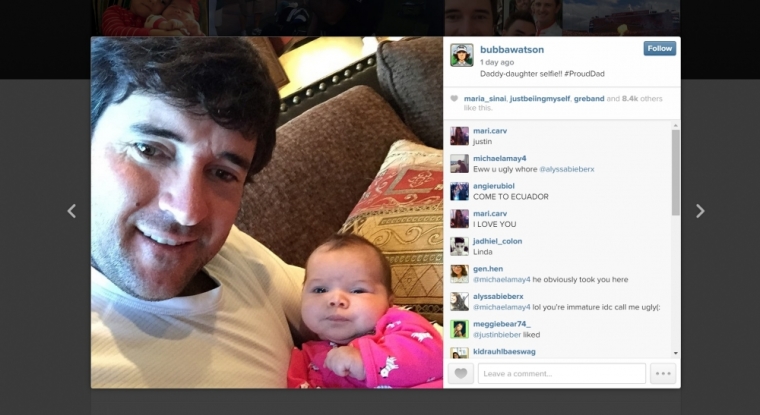 Pro-golfer Bubba Watson poses with baby Dakota. Though the adoption has not been finalized yet, the two-time Masters winner hopes his family will expand to a foursome soon.