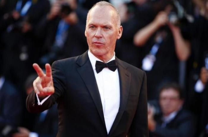 U.S. actor Michael Keaton poses during the red carpet for the movie ''Birdman or (The unexpected virtue of ignorance)'' at the 71st Venice Film Festival August 27, 2014.