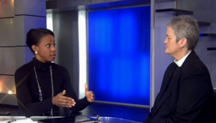 Georgia news station's 11Alive anchor Blayne Alexander (L) speaks with Atlanta-based Episcopal pastor Donna Mote (R) on Sunday, January, 4, 2015, about her upcoming trip to Cuba.