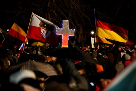 Participants take part in a demonstration called by anti-immigration group PEGIDA, a German abbreviation for 