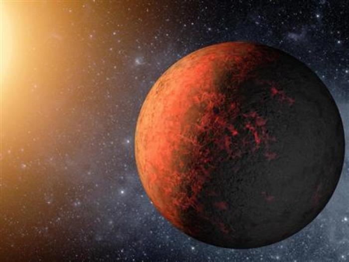 An artist's rendering shows a planet called Kepler-20e. The surface temperature of Kepler-20e, at more than 1,400 degrees Fahrenheit, would melt glass.