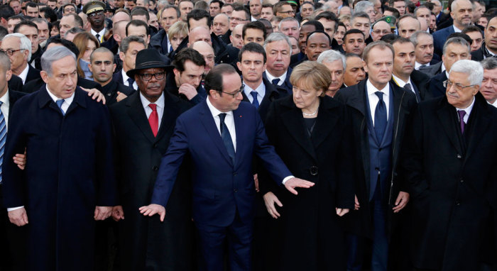 Israel's Prime Minister Benjamin Netanyahu (L), Mali's President Ibrahim Boubacar Keita (2ndL), French President Francois Hollande (C), Germany's Chancellor Angela Merke (4thL), European Council President Donald Tusk (5thL) and Palestinian President Mahmoud Abbas attend the solidarity march (Marche Republicaine) in the streets of Paris January 11, 2015. French citizens will be joined by dozens of foreign leaders, among them Arab and Muslim representatives, in a march on Sunday in an unprecedented tribute to this week's victims following the shootings by gunmen at the offices of the satirical weekly newspaper Charlie Hebdo, the killing of a police woman in Montrouge, and the hostage taking at a kosher supermarket at the Porte de Vincennes.